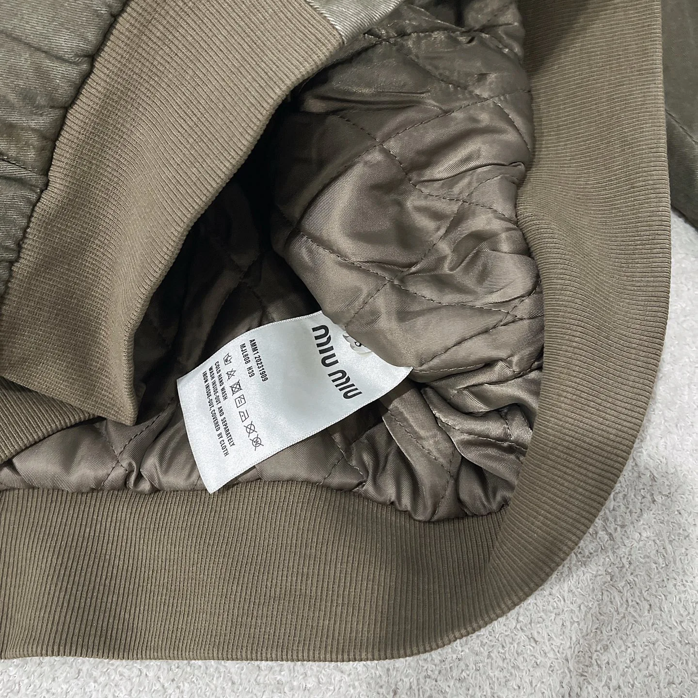 Куртки И Пуховики Женские Miu Miu 18428880