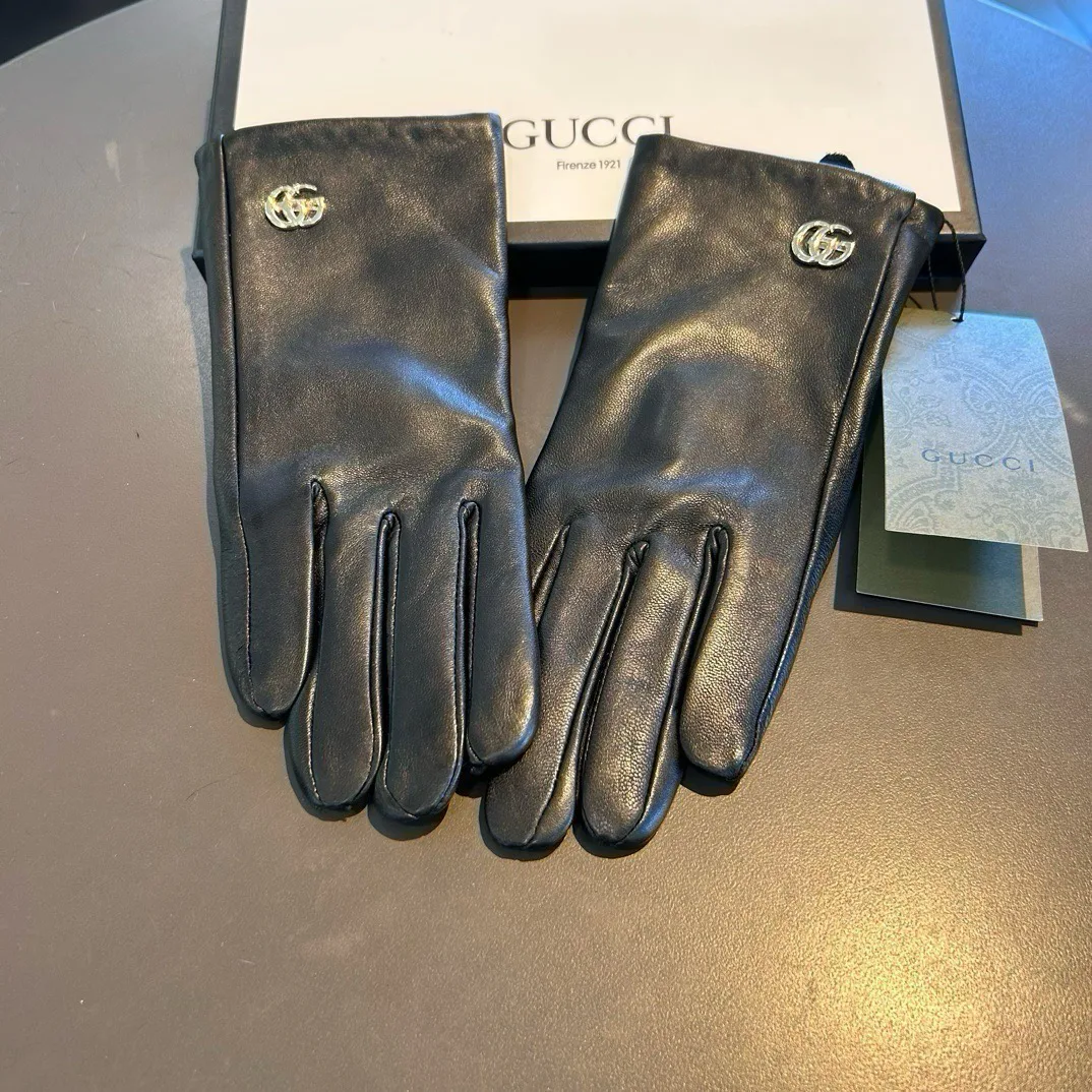 Перчатки Gucci 17562500