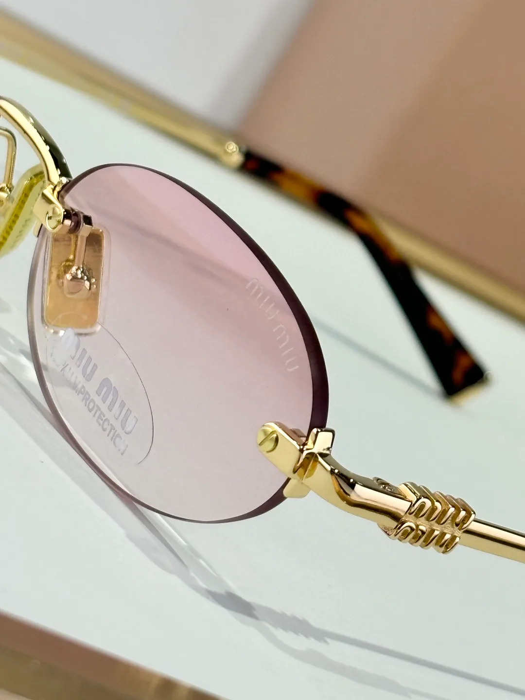 Очки Miu Miu 13352175