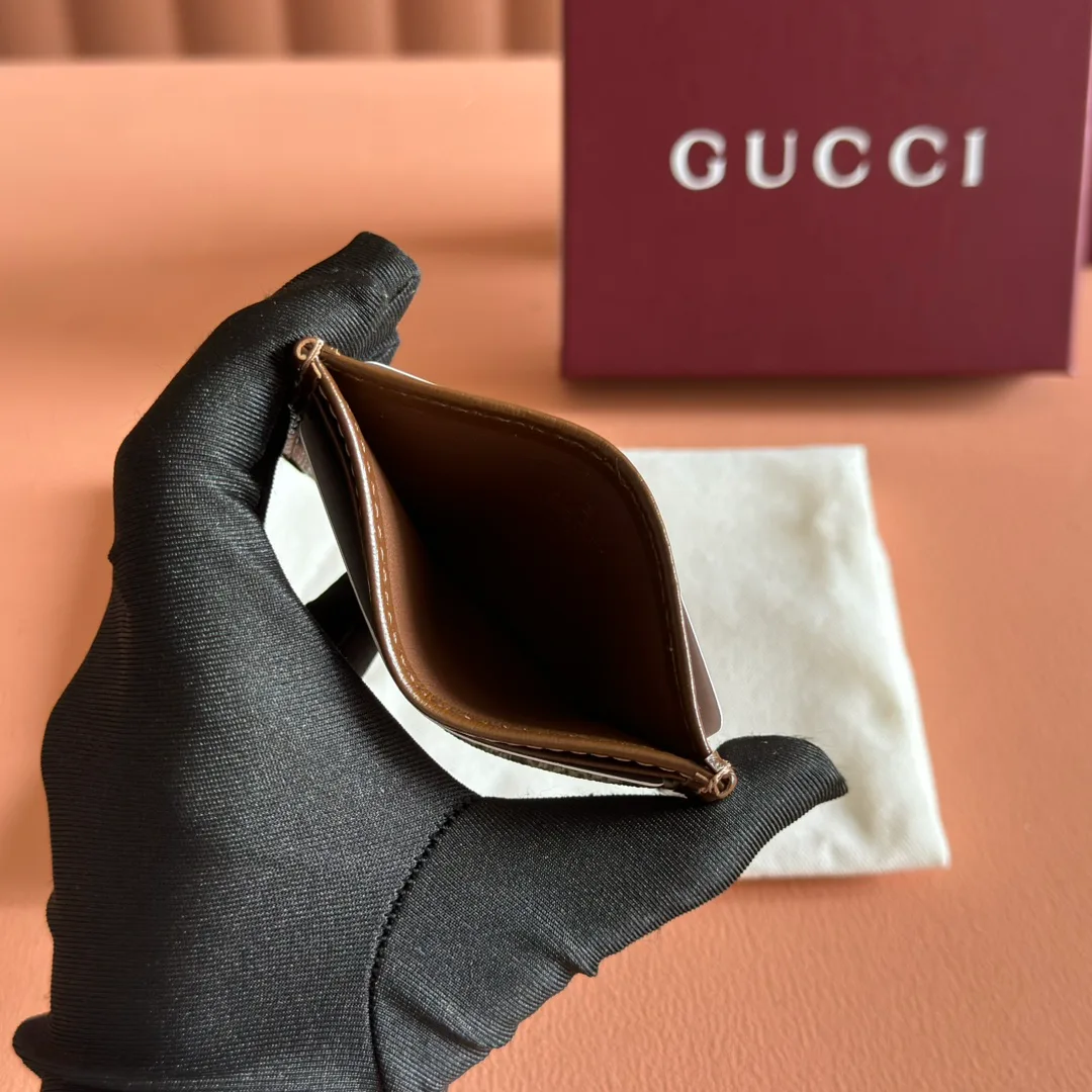 Кошельки Gucci 10393699